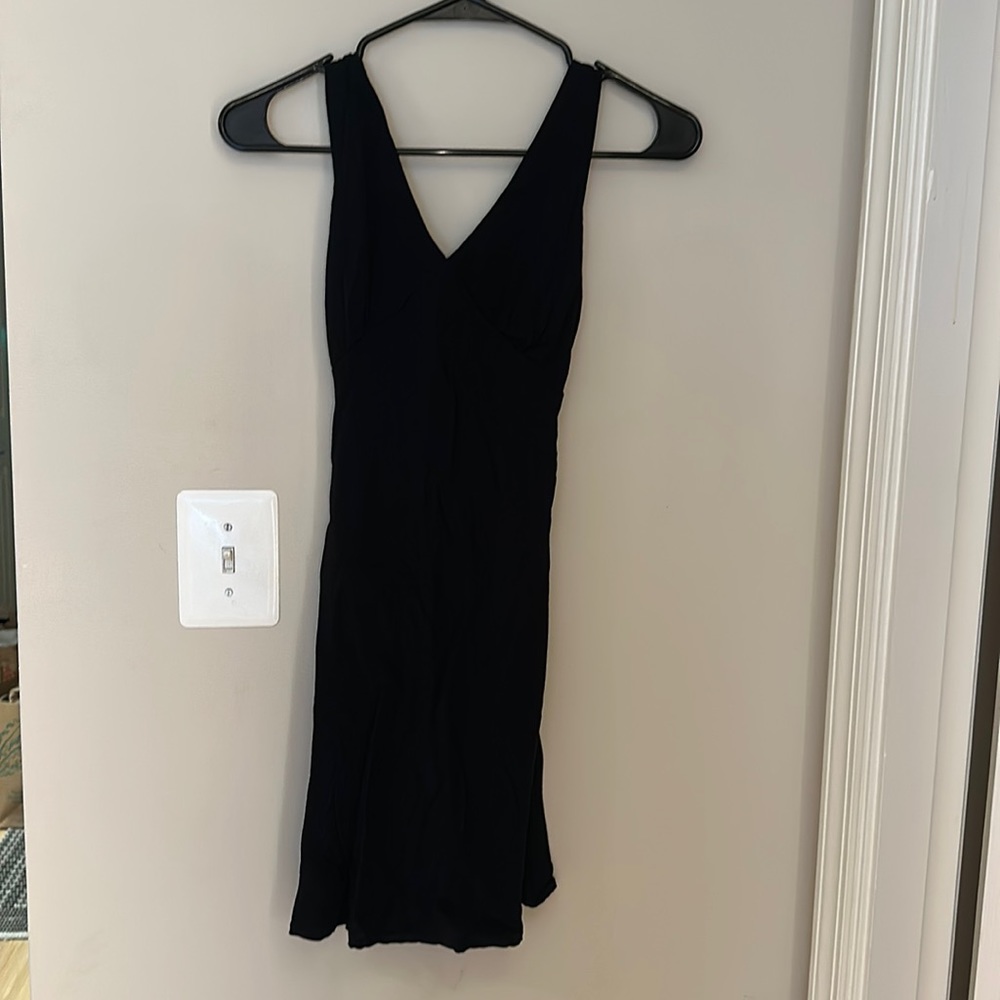 All black linen mini tie back flow dress!